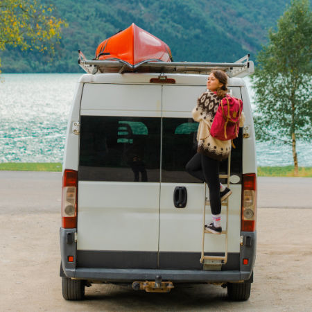 Woman on a camper van