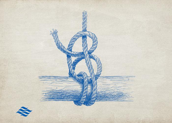 blue rope knot on parchment paper textured background