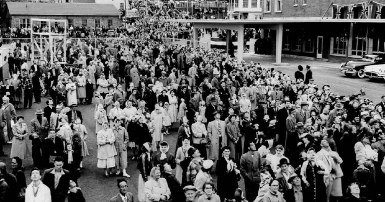 people waiting to board ship