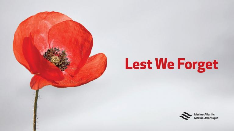 Image of a poppy flower with Lest We Forget text