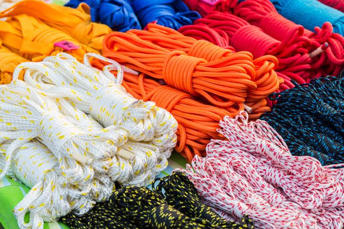 Several colourful types of industrial rope.