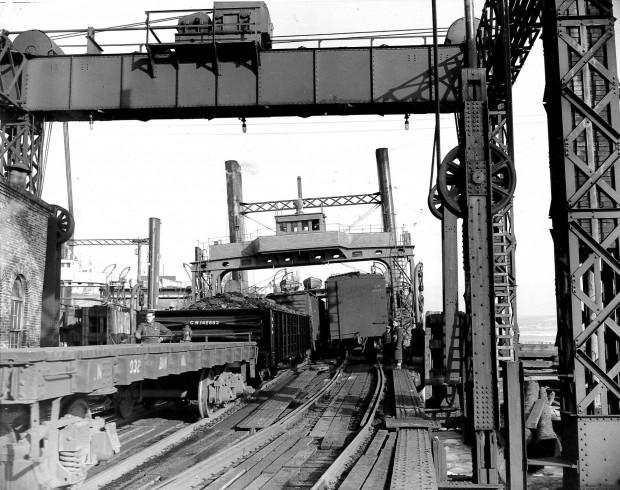 Image of train car on track toward terminal