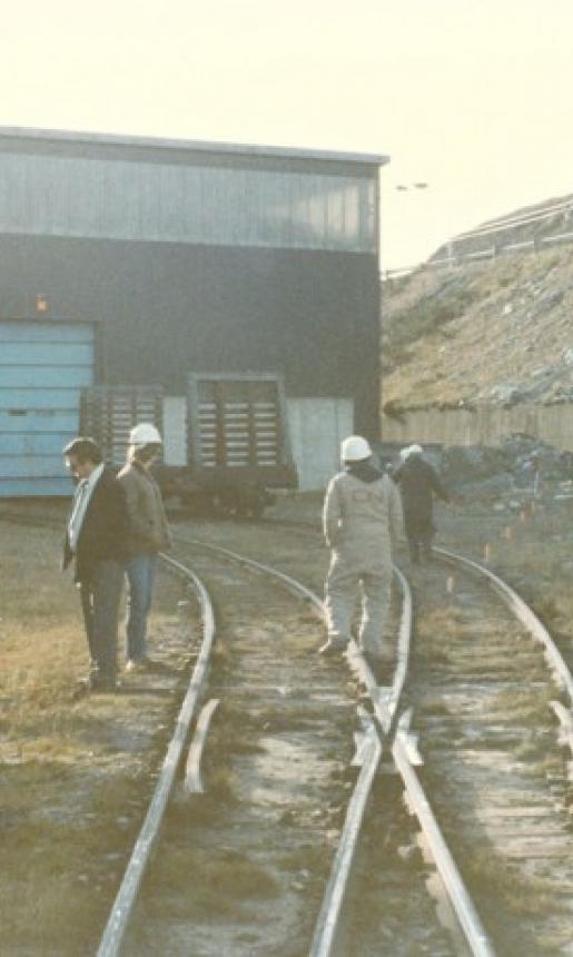 Image: 6 men in the railway yard